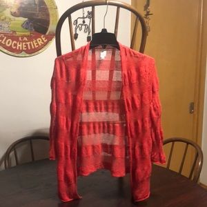 Woman’s soft peach sweater